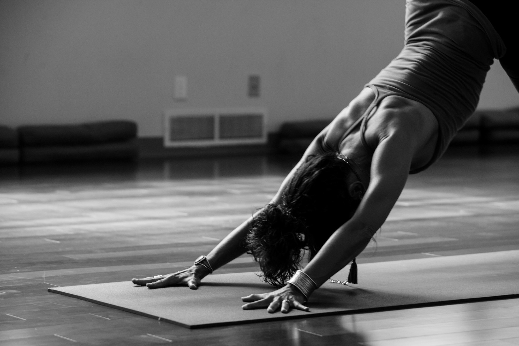 Reformer machines lined in a warm studio.